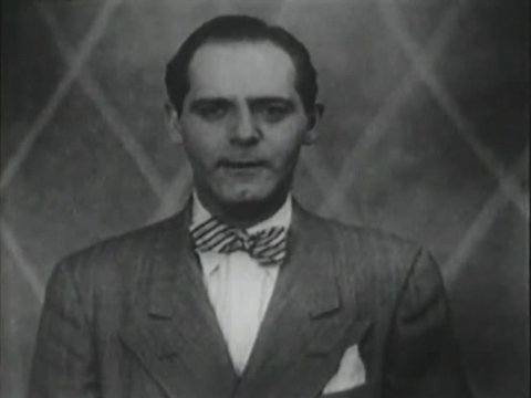 Black and white image of Ben Grauer, host of Eye Witness