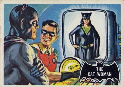 Scan of the front of a Batman trading card depicting Batman and Robin researching Cat Woman.