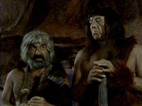 Image from an episode of It's About Time showing Cliff Norton (as Boss) and Mike Mazurki (as Clon)