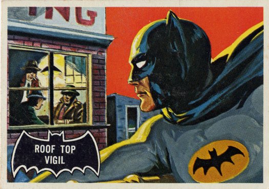 Scan of the front of a Batman trading card depicting Batman watching some bad guys through a window.