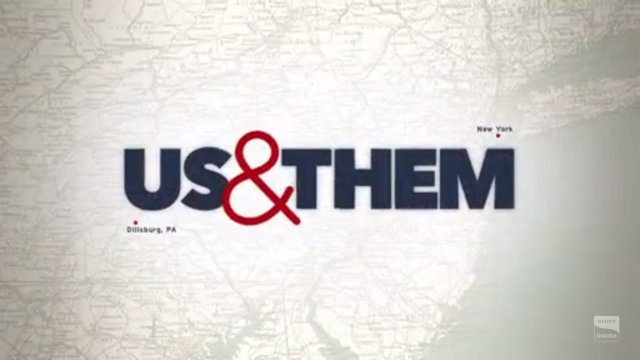 The Us & Them title card.