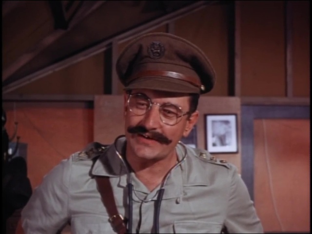 Still from the Camp Runamuck episode Say, You’re a Bleeder, Aren’t You? Asked Tom Cuttingly showing David Ketchum as Spiffy pretending to be Doctor Freddie Plumstead.