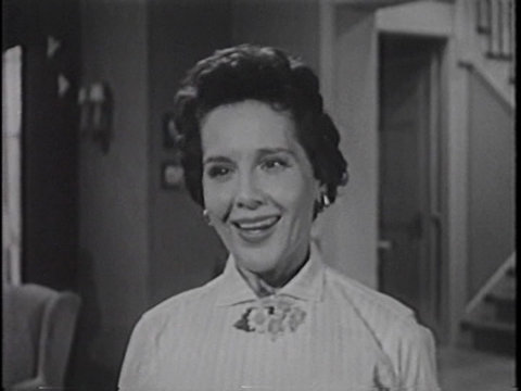 Black and white still from an episode of Meet Corliss Archer showing Mary Brian as Janet Archer.