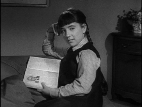 Black-and-white still from an episode of Karen featuring Gina Gillespie